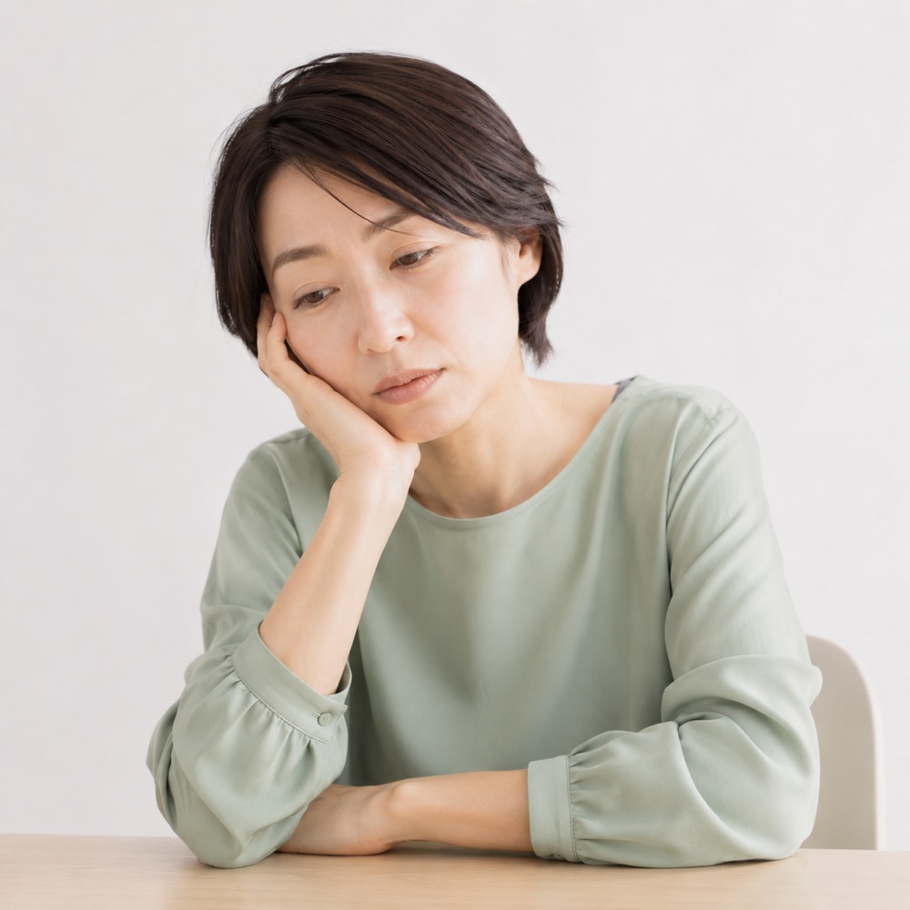 疲れを感じている女性