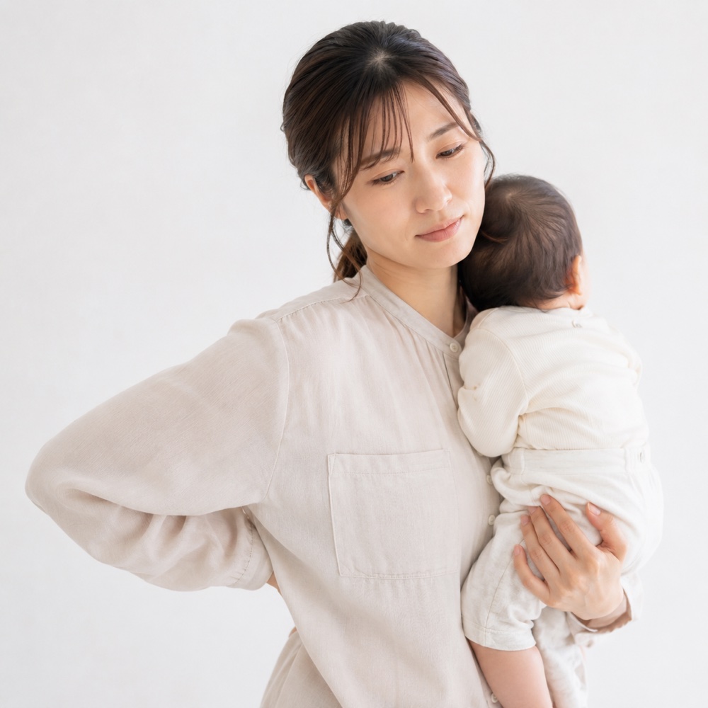 赤ちゃんを抱く女性